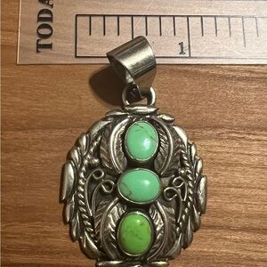 Silver Pendant with Green Stones